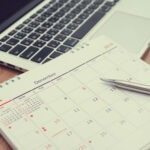 Steuerberatung Reindl, Hergenröder und Partner - Stift liegt auf Kalender.